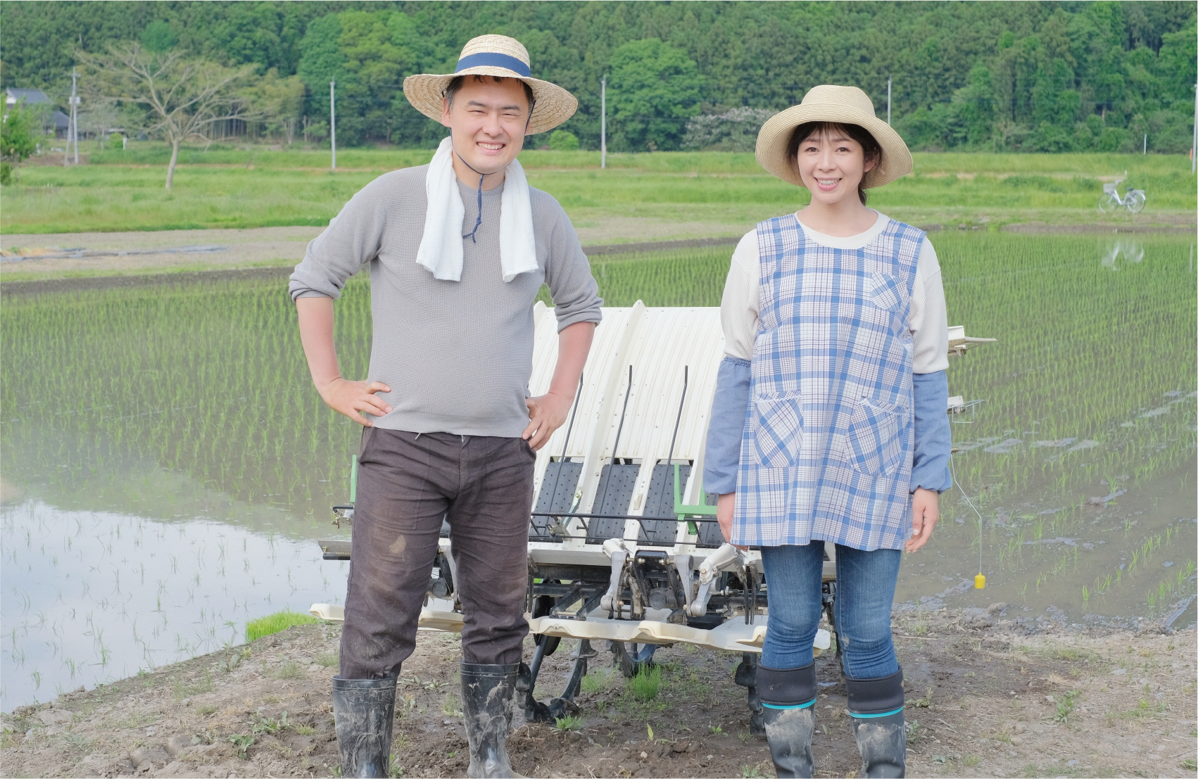 イメージ画像:米農家の夫婦が微笑む様子